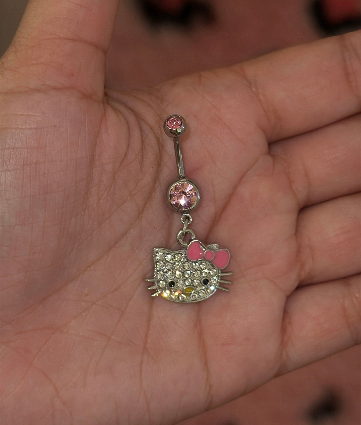 HK FACE BELLY PIERCING