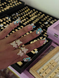 ADJUSTABLE BUTTERFLY RING