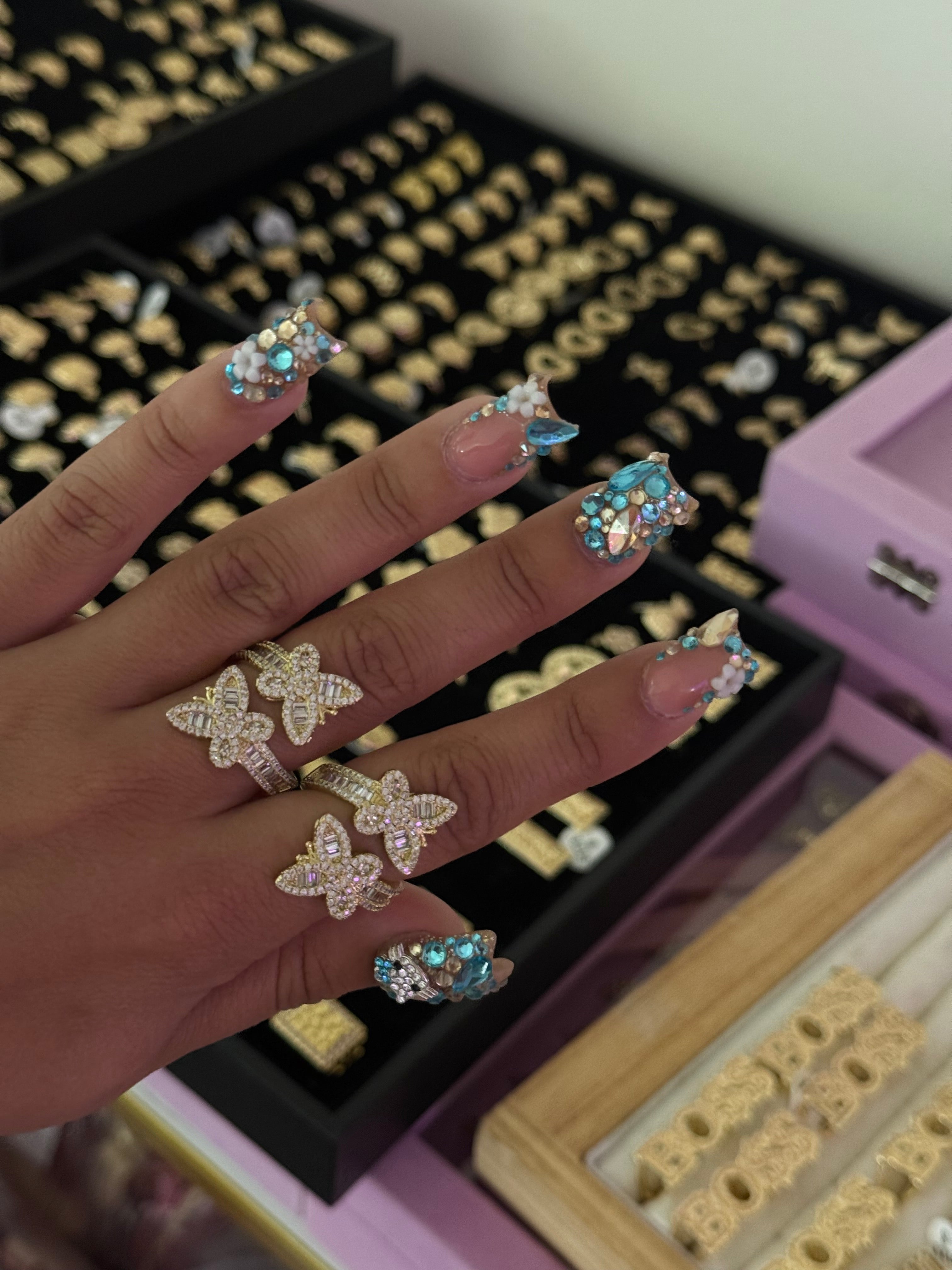 ADJUSTABLE BUTTERFLY RING