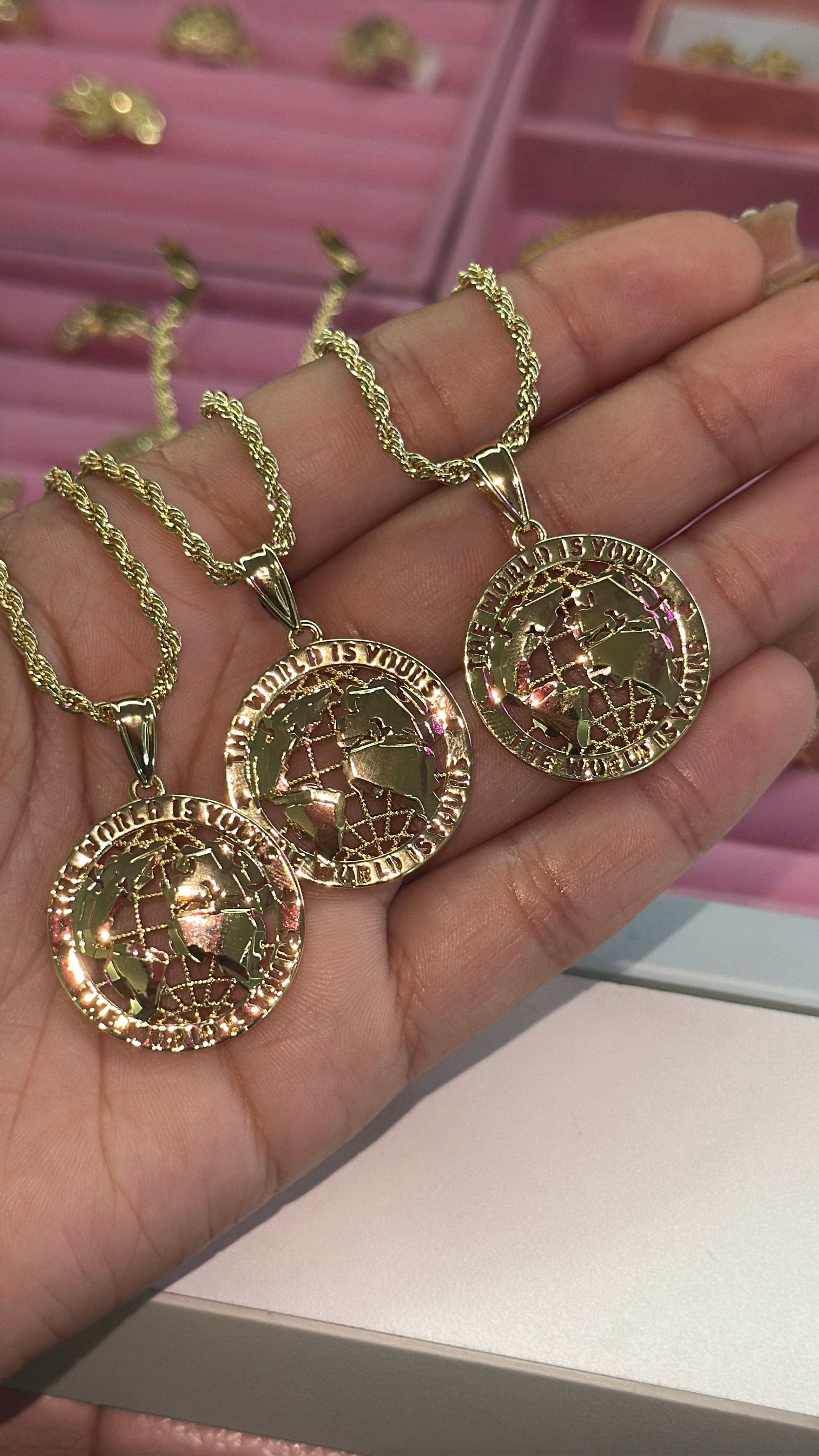 THE WORLD IS YOURS NECKLACE